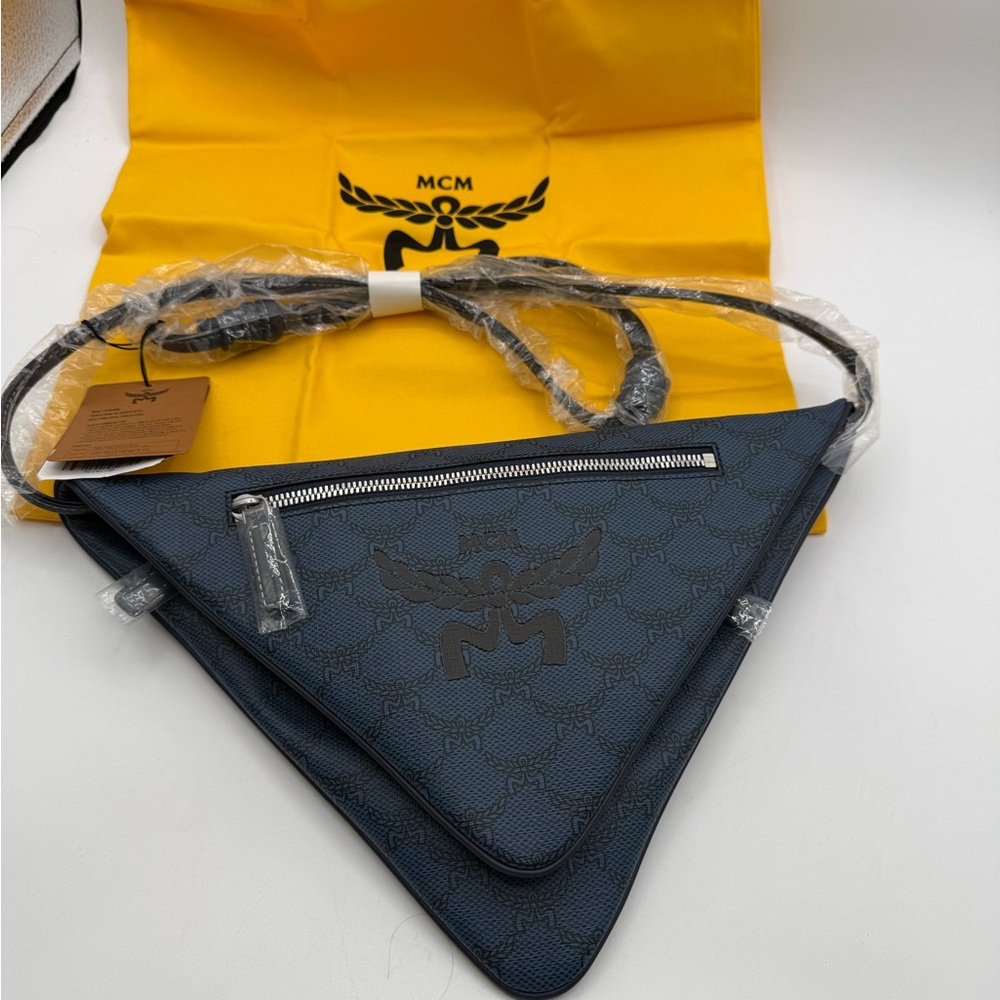 MCM Himmel Triangle Crossbody Bag in Lauretos Coated Canvas.